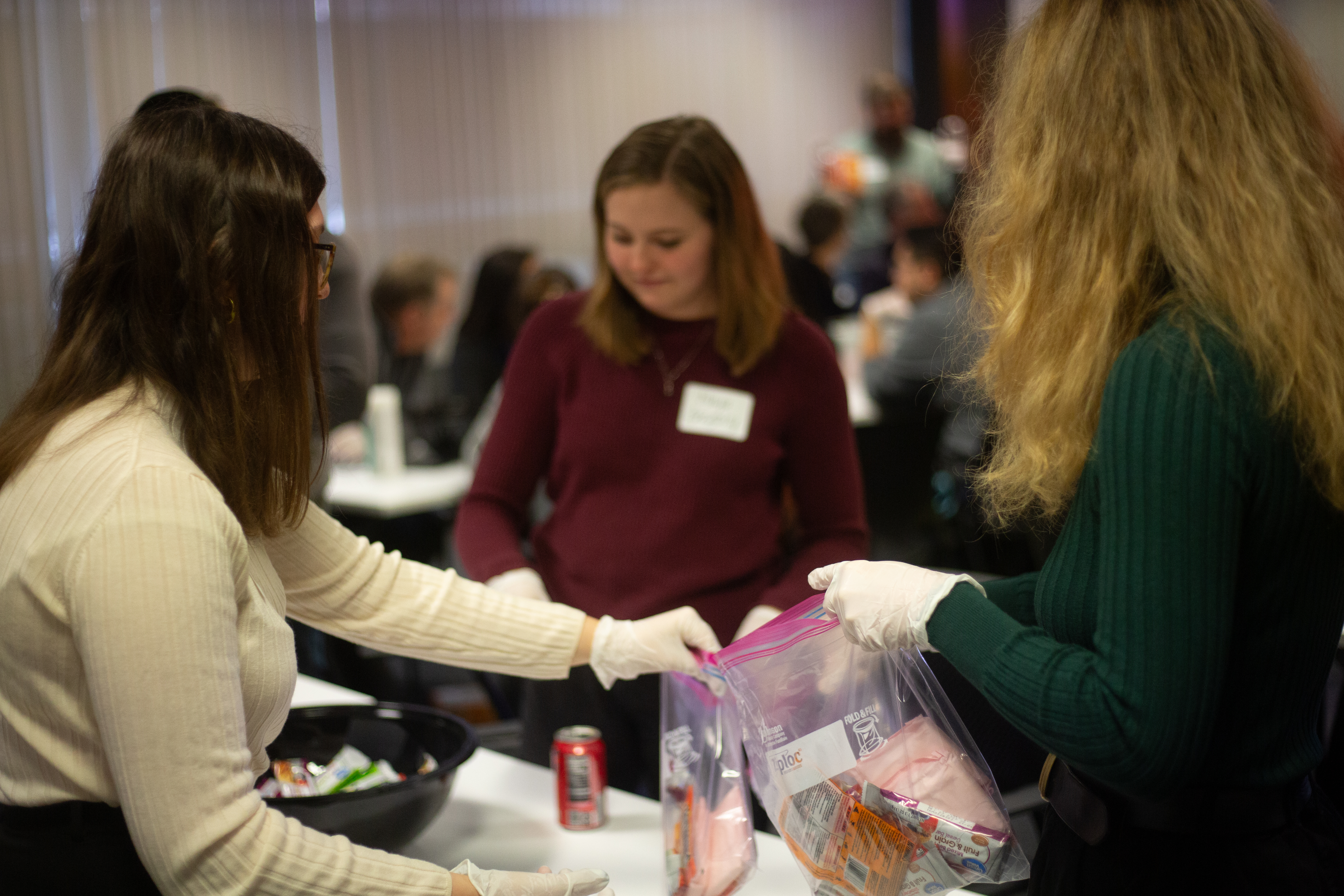 Participants assembling care packages